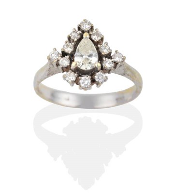 Lot 2026 - A Diamond Cluster Ring, a pear cut diamond within a border of round brilliant cut diamonds, to...
