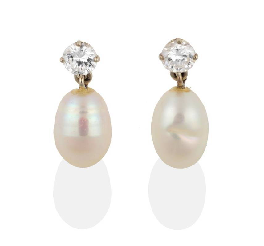 Lot 2037 - A Pair of Pearl and Diamond Earrings, round brilliant cut diamonds suspend drop pearls, total...