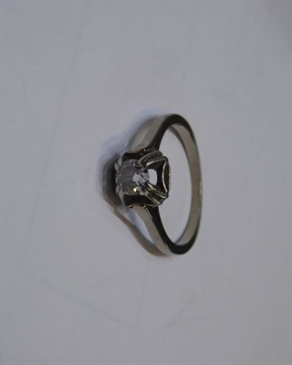 Lot 2056 - A 1940s French Solitaire Diamond Ring, an old cut diamond in an extended square claw setting,...