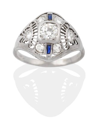 Lot 2060 - An Art Deco Sapphire and Diamond Cluster Ring, an old cut diamond within a tapering pierced...