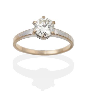 Lot 2061 - A Solitaire Diamond Ring, a round brilliant cut diamond in a claw setting, to tapering...