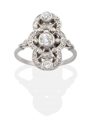 Lot 2065 - An Art Deco Diamond Plaque Ring, a central grain set old cut diamond within a single-cut...