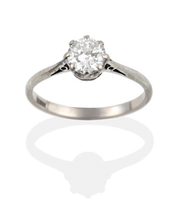 Lot 2074 - A Solitaire Diamond Ring, a round brilliant cut diamond in a claw setting, to tapering...