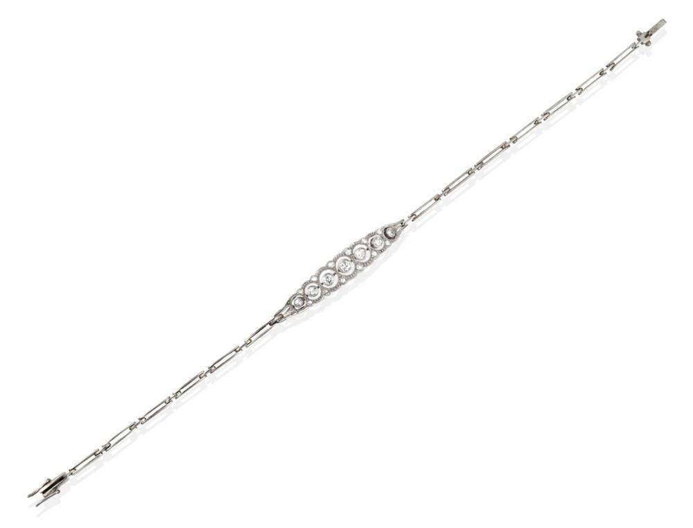 Lot 2076 - An Early Twentieth Century Diamond Bracelet, a band of graduated grain set old cut diamonds...