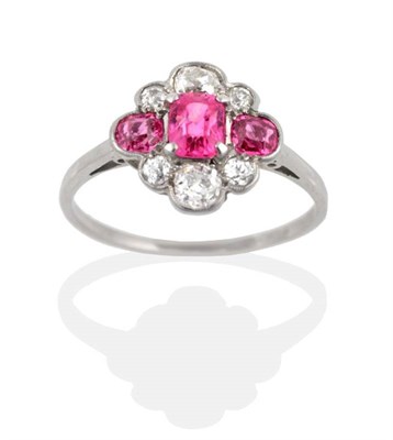 Lot 2078 - An Early Twentieth Century Pink Sapphire and Diamond Cluster Ring, an octagonal cut pink...