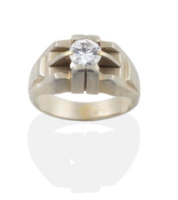 Lot 2088 - A 1940s Solitaire Diamond Ring, a round brilliant cut diamond in an extended claw setting, to...