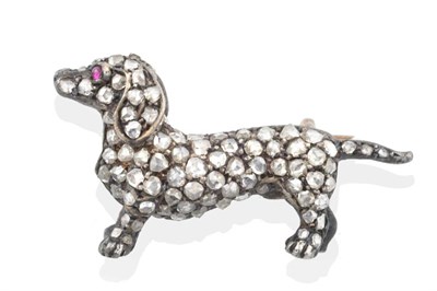 Lot 2090 - A Diamond Dachshund Brooch, modelled in standing pose with the front pavé set with rose cut...