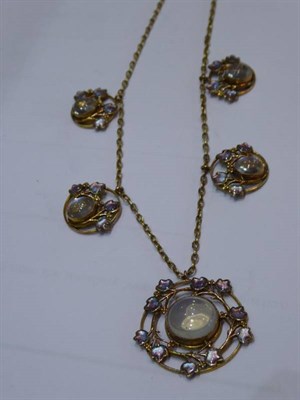 Lot 2100 - An Arts & Crafts Moonstone and Enamel Necklace, Attributed to Jessie M. King, a central pendant...