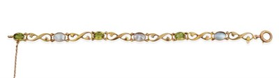 Lot 2105 - A Peridot and Mother-of-Pearl Bracelet by Murrle Bennett & Co, oval cut peridot and mother-of-pearl