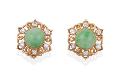 Lot 2106 - A Pair of Jade and Diamond Earrings, round jade within scrolling frames set with round...