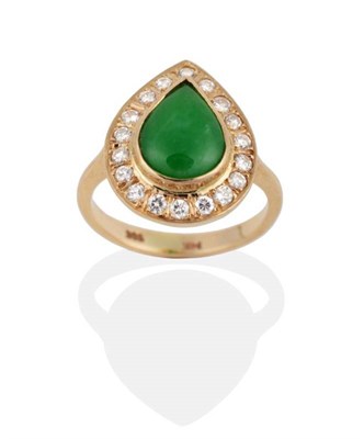 Lot 2112 - A Jade and Diamond Cluster Ring, a pear cut jade within a border of round brilliant cut...
