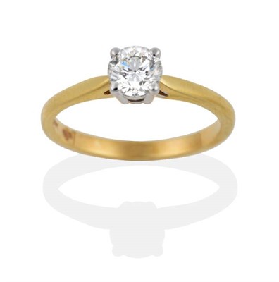 Lot 2125 - An 18 Carat Gold Solitaire Diamond Ring, a round brilliant cut diamond in a claw setting, to...