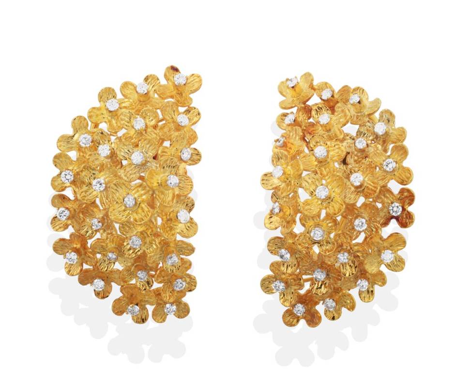 Lot 2154 - A Pair of Diamond Earrings, as a curved band of round brilliant cut diamond set textured flower...