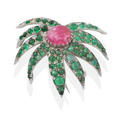 Lot 2175 - A Ruby and Emerald Spray Brooch, an oval cabochon ruby in a claw setting within a border of...