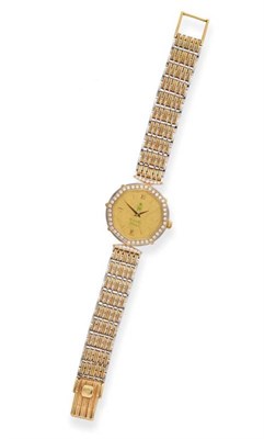 Lot 2212 - A Lady's Two Colour 18ct Gold Diamond Set Wristwatch, signed Royama, Geneve, circa 1995, lever...