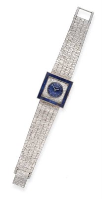 Lot 2226 - A Lady's White Metal Wristwatch with an Unusual Lapis Set Bezel, signed Tissot, model: Stylist,...