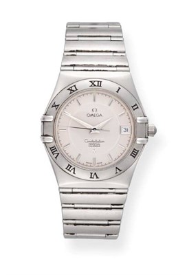 Lot 2231 - A Stainless Steel Calendar Centre Seconds Wristwatch, signed Omega, model: Constellation...