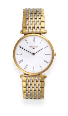 Lot 2240 - A Bi-Metal Wristwatch, signed Longines, model: La Grande Classique de Longines, ref: L4 709 2,...