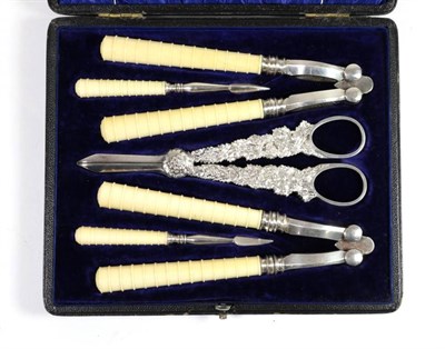 Lot 2274 - A Late Victorian Electroplated Grape and Nut Set, Mappin & Webb, circa 1900, comprising: a pair...