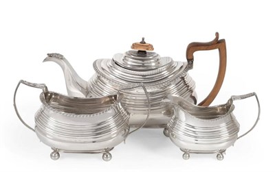 Lot 2288 - A George IV Silver Three Piece Tea Service, William Bateman, London 1820/21, oval bellied form with