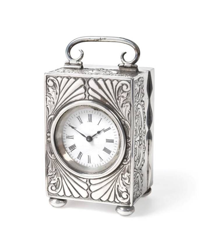Lot 2373 - A Late Victorian Silver Bedside or Boudoir Timepiece, maker's mark GB, Birmingham 1899, the...