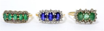 Lot 5 - A 9 carat gold sapphire and diamond ring, finger size R; a 9 carat gold emerald and diamond...