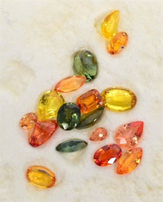 Lot 17 - Seventeen various loose yellow, orange and green sapphires, totalling 10.82 carat approximately, of