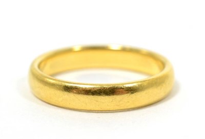 Lot 22 - An 18 carat gold ring, finger size N, 4.7g