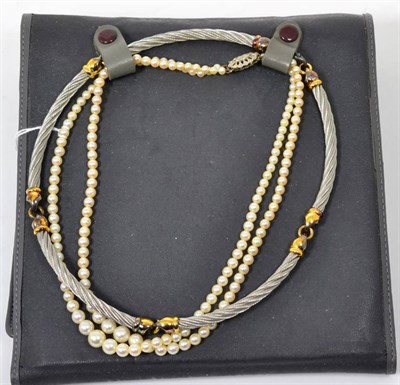Lot 37 - A double strand graduated cultured pearl necklace, length 39cm and a Philippe Charriol...