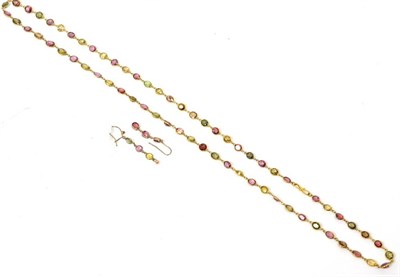Lot 42 - A multi-gemstone necklace and earring suite, oval cut garnets and green yellow stones as individual