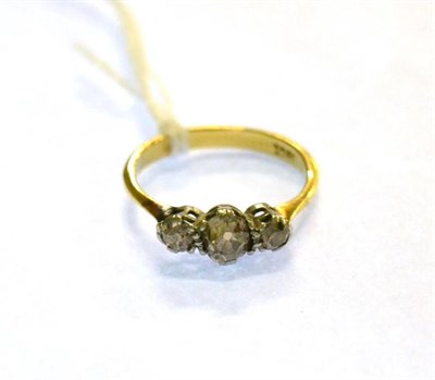 Lot 56 - An 18 carat gold diamond three stone ring