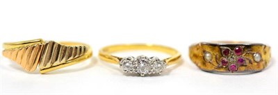 Lot 59 - A diamond three stone ring, total estimated diamond weight 0.35 carat approximately, finger...