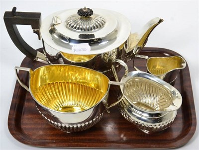 Lot 73 - An Edwardian silver teapot with matching silver sugar bowl, with silver gilt interior; an...