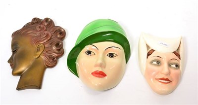 Lot 77 - A Crown Devon Art Deco wall mask, hand painted by Dorothy Ann, of a woman wearing a green hat,...