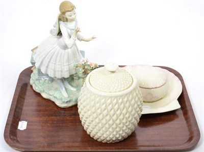 Lot 85 - A Lladro figure of a young girl; Belleek pineapple shaped jar and cover; a shell shaped plate;...