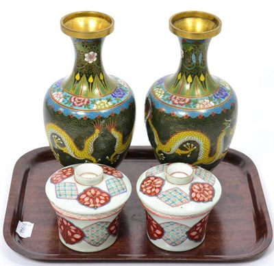 Lot 91 - A pair of Japanese porcelain pots and covers; and a pair of cloisonne enamel vases