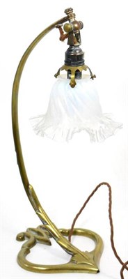Lot 93 - An Arts and Crafts brass table lamp in the manner of W A S Benson, with frilled glass shade