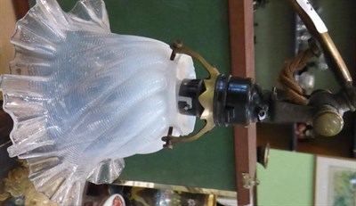 Lot 93 - An Arts and Crafts brass table lamp in the manner of W A S Benson, with frilled glass shade
