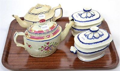 Lot 99 - An early 19th century polychrome painted Pearlware teapot; another teapot; and a pair of blue...