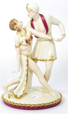 Lot 124 - A Royal Dux Art Deco Figural Group, modelled as two dancers in Arabic dress believed to be...