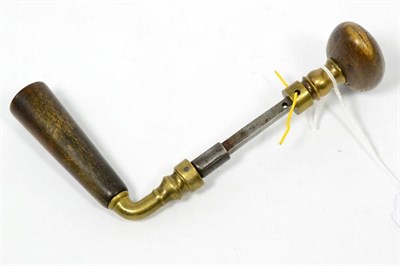 Lot 130 - A Rhinoceros horn mounted brass and steel door handle, 19th century, with ovoid and tapering...