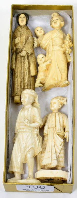 Lot 136 - Three early 20th century ivory figures; and one other bone example