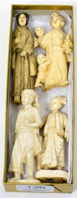 Lot 136 - Three early 20th century ivory figures; and one other bone example