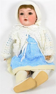 Lot 143 - A German bisque head doll, ball jointed