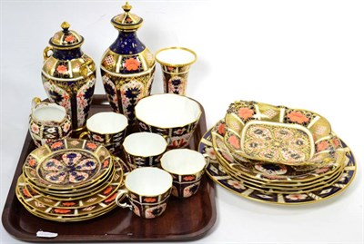 Lot 145 - A collection of Royal Crown Derby Imari palette wares, comprising: two lidded vases, a trumpet...