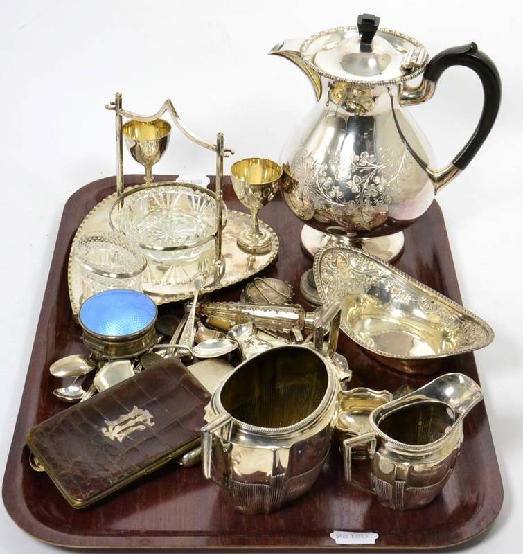 Lot 162 - A quantity of silver items to include: a cream jug and sugar bowl; enamel ring box; cigarette case