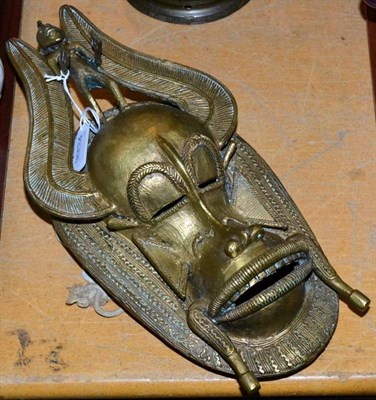 Lot 176 - A gilt metal Shanti mask