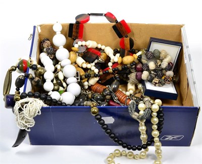Lot 194 - A quantity of beaded necklaces, including horn and coloured wood bead examples and a pair of...