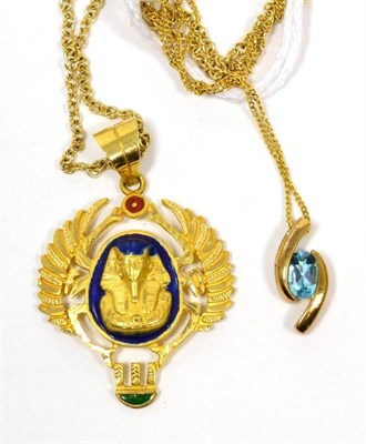 Lot 200 - An enamelled Egyptian pendant stamped with Egyptian 18 carat gold marks, on an 18 carat gold...