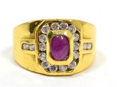 Lot 202 - A ruby cabochon and white stone ring, finger size P, stamped '750', 7g